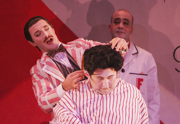 Jose Carbo (left) is the wily title character in a Sydney Opera House production of Rossini's Il barbieri di Siviglia.