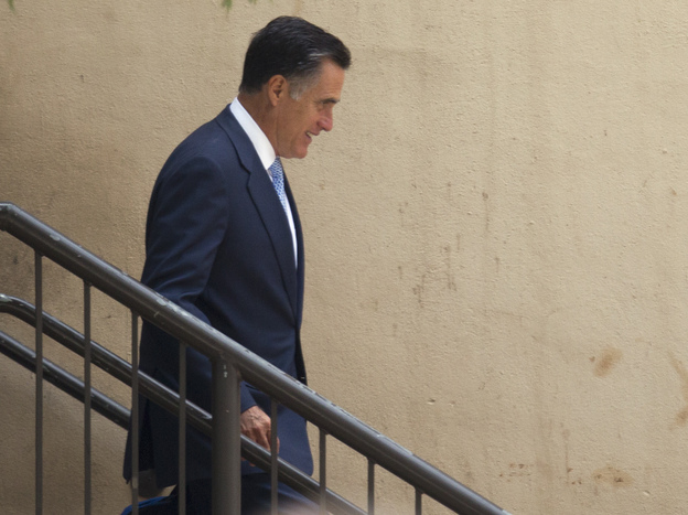 Mitt Romney leaves a fundraiser in Baton Rouge, La., on Monday. (AP)