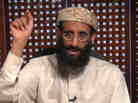 In this image taken from video and released by SITE Intelligence Group, Anwar al-Awlaki speaks in a video message posted on radical websites in November, 2010. In this image taken from video and released by SITE Intelligence Group, Anwar al-Awlaki speaks in a video message posted on radical websites in November, 2010.