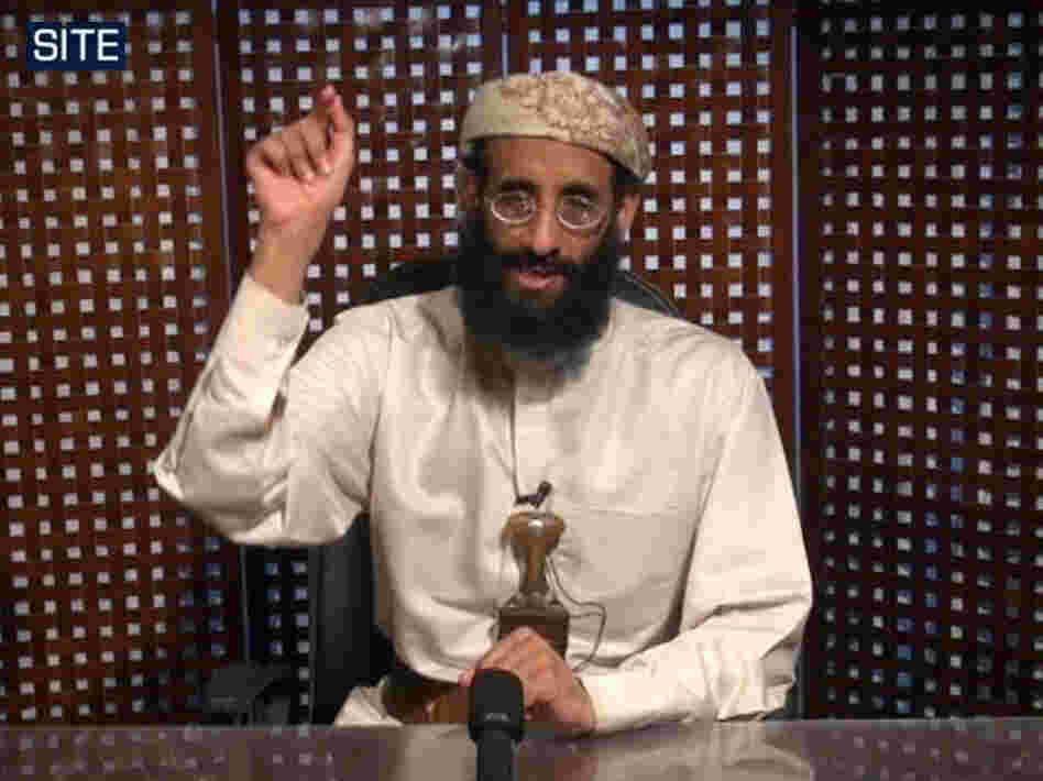 In this image taken from video and released by SITE Intelligence Group, Anwar al-Awlaki speaks in a video message posted on radical websites in November, 2010.