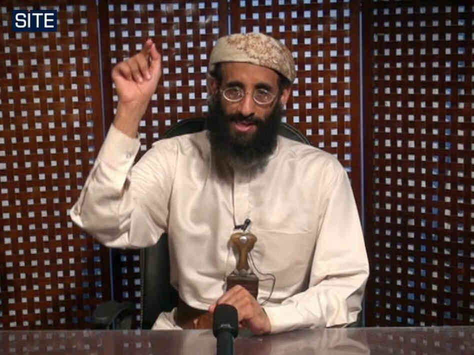 In this image taken from video and released by SITE Intelligence Group, Anwar al-Awlaki speaks in a video message posted on radical websites in November, 2010.