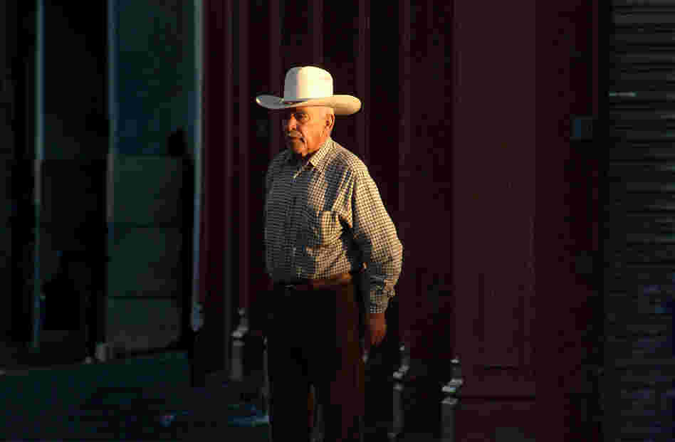 Dignified Man, 2006. This "viejo" (old one) walks on this street every evening. 6th and El Paso St. This is the first street in the U.S. after crossing from Juarez into downtown El Paso. In essence, this is the first block of America (or the last, depending on which direction you're going).