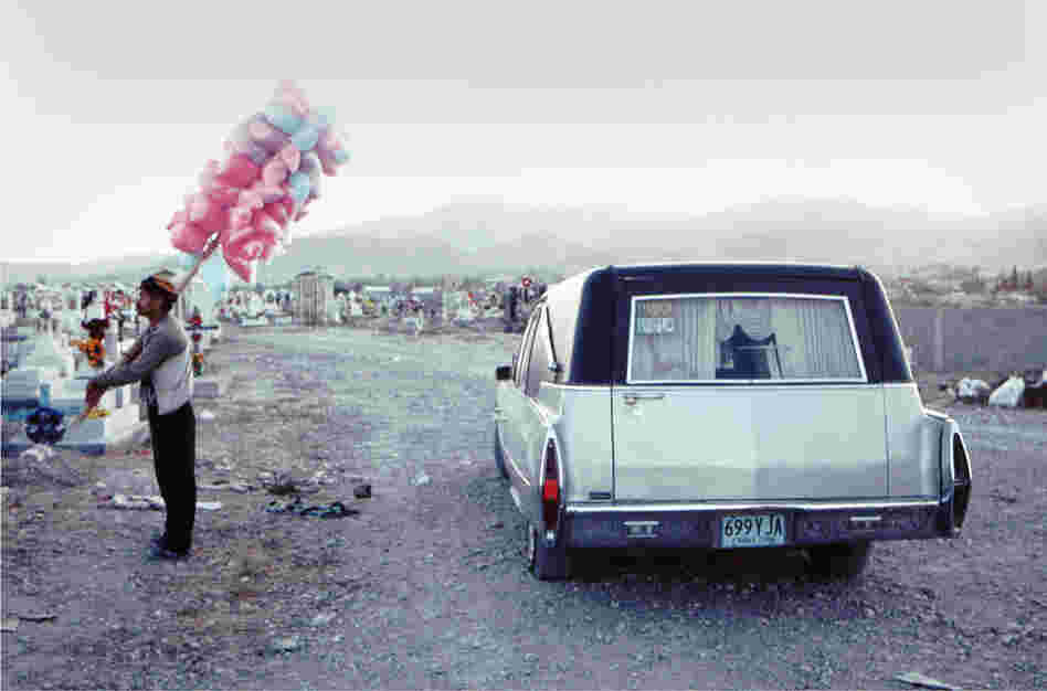 Candyman in El Panteon. The Panteon of Juarez (the municipal cemetery) on the Day of the Dead, 1994. The celebration is still honored, but there have been so many funerals in Juarez during the cartel war years that people are closer to death than is comfortable.
