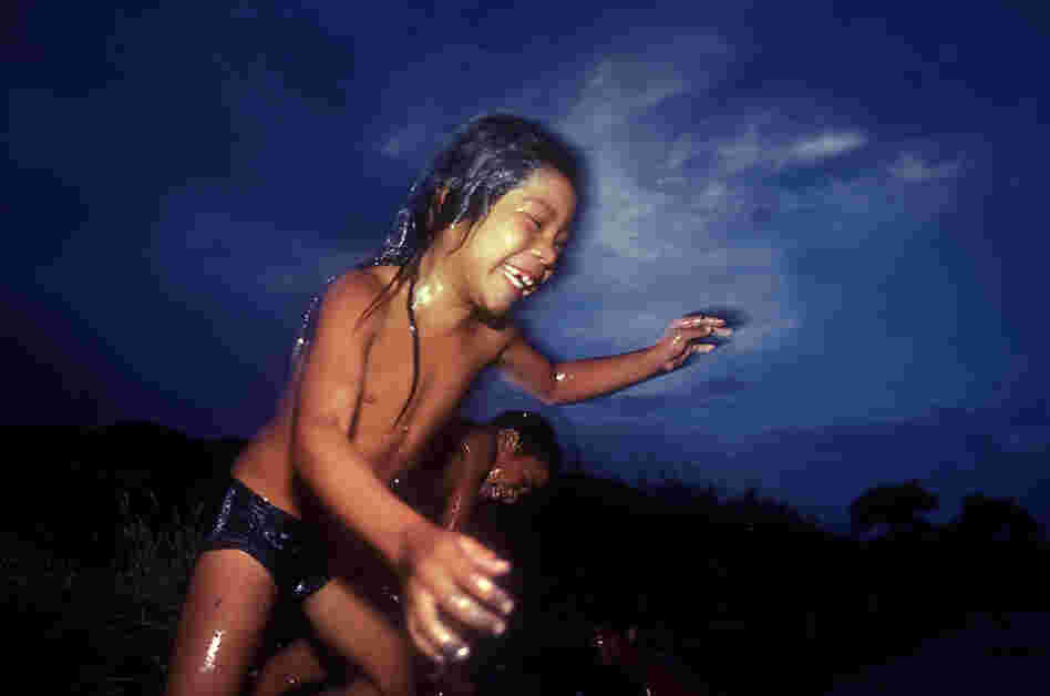 River Jump in the River with Two Names, 1989. Kids cool off in the river with two names — Rio Grande on the U.S. side, and Rio Bravo in Mexico.