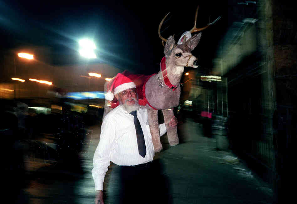 Santa Claus and his reindeer in the Plaza de Juarez, Christmas Eve, 2003