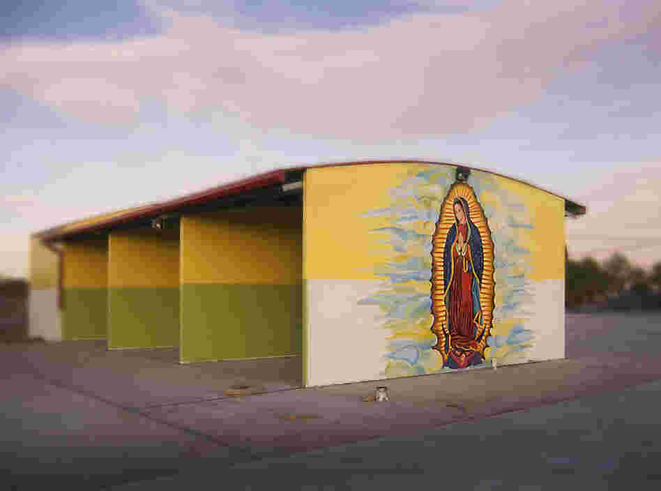 The Virgin's Car Wash, 2005. The Virgin de Guadalupe on an unfinished car wash in El Paso.