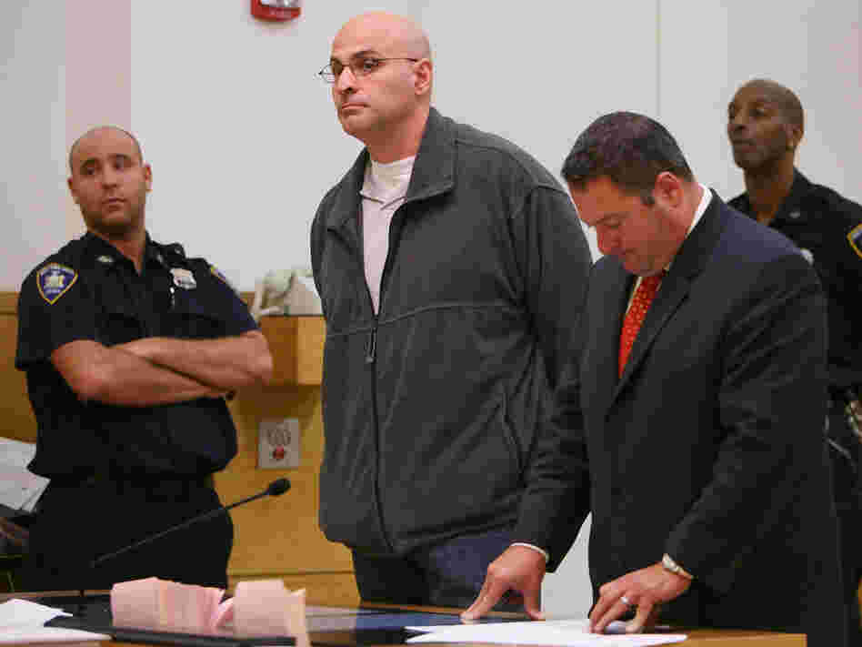 Michael Mastromarino (center) appeared in a New York City courtroom for sentencing on charges of corruption, body stealing and reckless endangerment, as the mastermind behind a scheme to loot hundreds of corpses and sell bone and tissue for transplants.