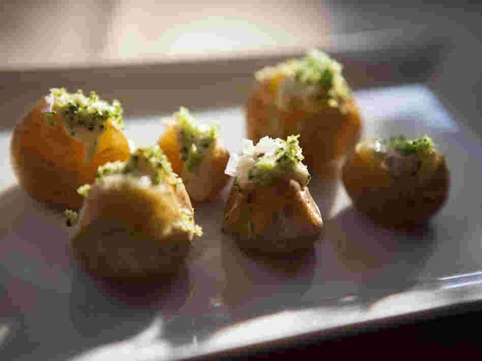 Tiny spuds decked out with cheese fondue sauce and a sprinkling of broccoli shavings at a dinner sponsored by the U.S. Potato Board.