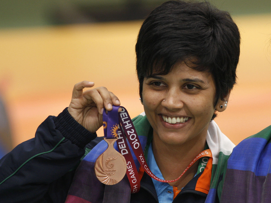 India's Suma Shirur won bronze in women's 10m air rifle pairs at the 2010 Commonwealth Games in New Delhi. She says her part-time government job gave her the time and financial stability to train for the 2004 Olympics in Athens.