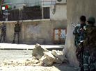 Video taken from Syrian TV purportedly shows government forces taking up position during clashes with rebels Wednesday in the Al-Midan district of Damascus. Video taken from Syrian TV purportedly shows government forces taking up position during clashes with rebels Wednesday in the Al-Midan district of Damascus.