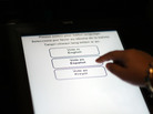 A Florida election official tests the accuracy of a voting machine on Aug. 4, 2010, in Miami. A Florida election official tests the accuracy of a voting machine on Aug. 4, 2010, in Miami.