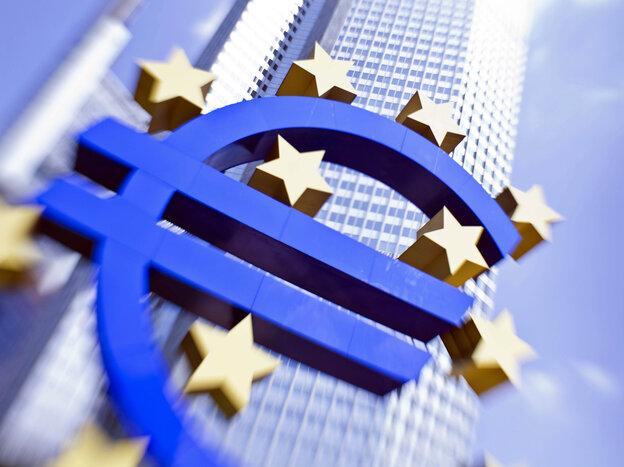 Monument to headier times: The euro logo outside the European Central Bank in Frankfurt. The International Monetary Fund has warned of possible deflation in parts of Europe.