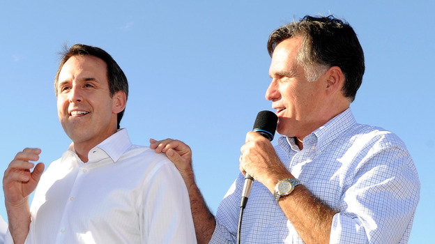 Former Minnesota Gov. Tim Pawlenty and GOP presidential candidate Mitt Romney campaign in Las Vegas on Oct.  17, 2011.
