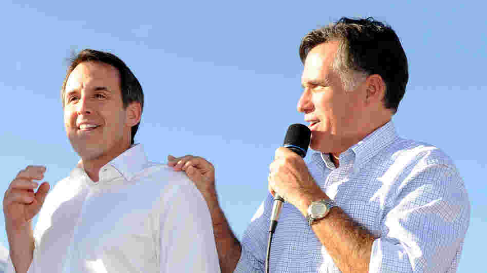 Former Minnesota Gov. Tim Pawlenty and GOP presidential candidate Mitt Romney campaign in Las Vegas on Oct.  17, 2011.