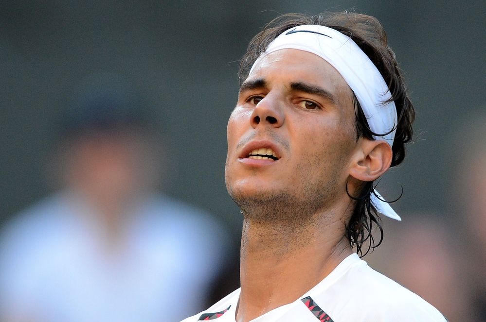 Spain's Rafael Nadal looks on during his Wimbledon loss to Czech Republic's Lukas Rosol in June.