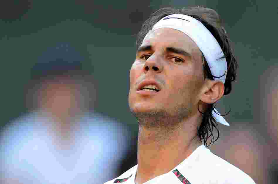 Spain's Rafael Nadal looks on during his Wimbledon loss to Czech Republic's Lukas Rosol in June.