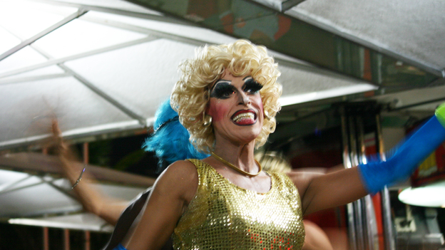 Drag queens at an outdoor restaurant in Copacabana incorporate safe sex messages into a show of lip-synced songs and risque jokes.