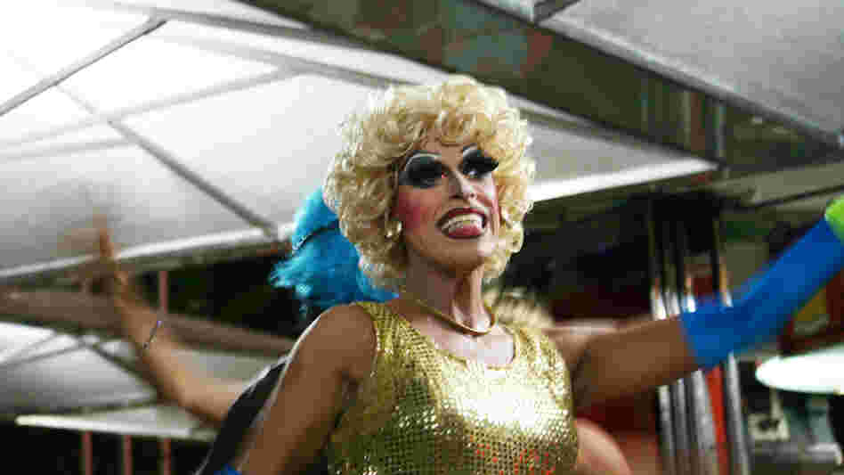 Drag queens at an outdoor restaurant in Copacabana incorporate safe sex messages into a show of lip-synced songs and risque jokes.
