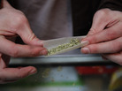 A marijuana cigarette in British Columbia. Our panel of economists agrees that criminalizing pot is a huge waste of resources. A marijuana cigarette in British Columbia. Our panel of economists agrees that criminalizing pot is a huge waste of resources.