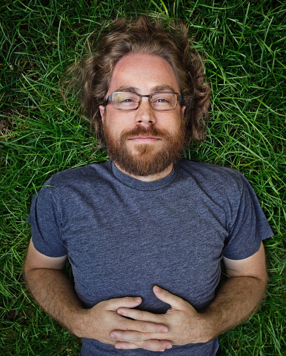 Ask Me Another resident musician, Jonathan Coulton, keeps audiences entertained with his offbeat lyrics and entertaining covers of popular music. JoCo quit his day job writing software in 2005 to pursue a career in music.