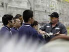 Kelly Thompson, a mentor at Siemens, gives apprentices an orientation of the factory. The program provides on-the-job training in manufacturing. Kelly Thompson, a mentor at Siemens, gives apprentices an orientation of the factory. The program provides on-the-job training in manufacturing.
