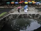 Pedestrians stand along the River Walk in San Antonio, Texas, in May. The state has gotten a reprieve from more than a year of drought. Pedestrians stand along the River Walk in San Antonio, Texas, in May. The state has gotten a reprieve from more than a year of drought.