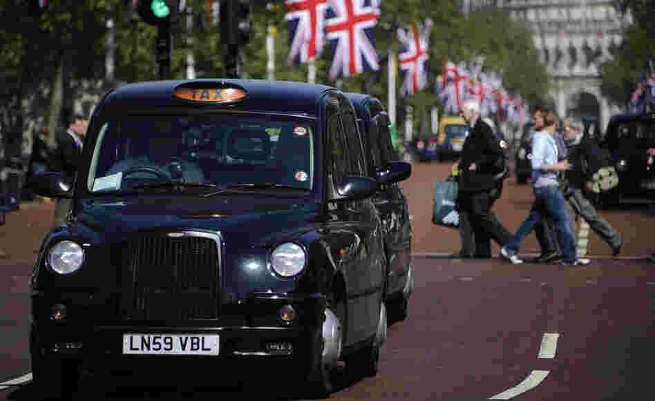 Black taxis drive through London. Weekend Edition knows one London cabbie who treats reading like an Olympic sport. Black taxis drive through London. Weekend Edition knows one London cabbie who treats reading like an Olympic sport.