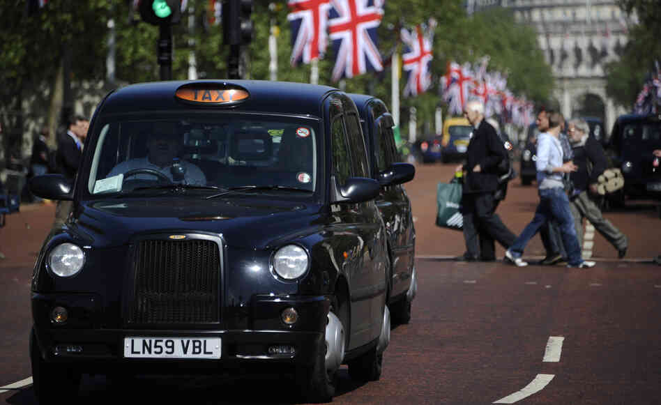 Black taxis drive through London. Weekend Edition knows one London cabbie who treats reading like an Olympic sport. Black taxis drive through London. Weekend Edition knows one London cabbie who treats reading like an Olympic sport.