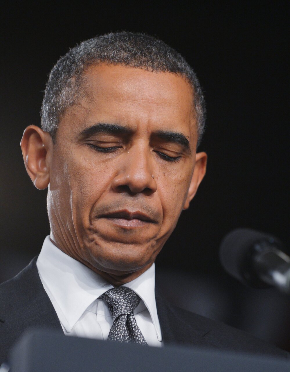 President Obama turned a planned campaign speech in Fort Myers, Fla., into a brief statement about the shooting rampage. He asked the audience to join him in a moment of silence for the victims.