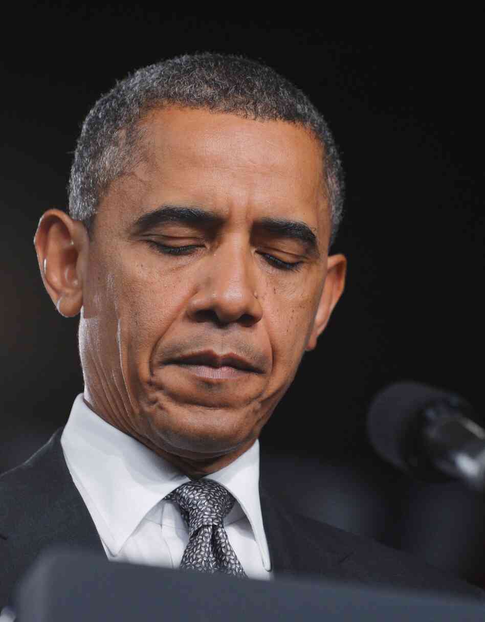 President Obama turned a planned campaign speech in Fort Myers, Fla., into a brief statement about the shooting rampage. He asked the audience to join him in a moment of silence for the victims.