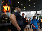 A policeman stands outside a movie theater in New York on Friday during a showing of "The Dark Knight Rises." A policeman stands outside a movie theater in New York on Friday during a showing of "The Dark Knight Rises."