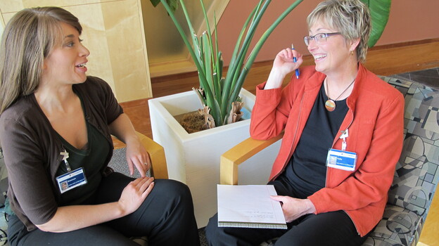 Shannon Orley, left, meets with her health coach, Kelly Heithold, right, at Providence Alaska Medical Center.