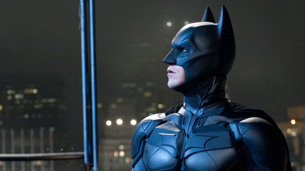 Emotional Armor: Superheroes like Batman (Christian Bale) function as talismans when our fears are darkest — symbols of good, and of justice, when we wonder whether either exists.