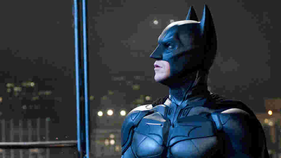 Emotional Armor: Superheroes like Batman (Christian Bale) function as talismans when our fears are darkest — symbols of good, and of justice, when we wonder whether either exists.