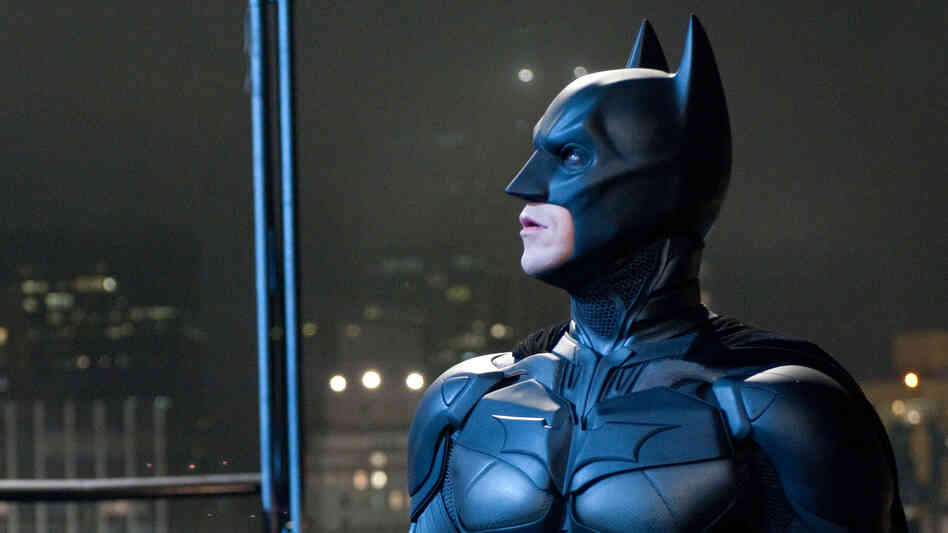 Emotional Armor: Superheroes like Batman (Christian Bale) function as talismans when our fears are darkest — symbols of good, and of justice, when we wonder whether either exists.