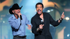 Kenny Chesney (left) performs with Lionel Richie at an April 2 event called Lionel Richie and Friends in Concert in Las Vegas. Other performers at the concert included country stars Tim McGraw, Jason Aldean, The Band Perry and Rascal Flatts. Kenny Chesney (left) performs with Lionel Richie at an April 2 event called Lionel Richie and Friends in Concert in Las Vegas. Other performers at the concert included country stars Tim McGraw, Jason Aldean, The Band Perry and Rascal Flatts.