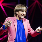 "Sonochromatic cyborg" and artist Neil Harbisson — with the implanted device that converts color to sound — at his TED talk in Edinburgh last month. "Sonochromatic cyborg" and artist Neil Harbisson — with the implanted device that converts color to sound — at his TED talk in Edinburgh last month.