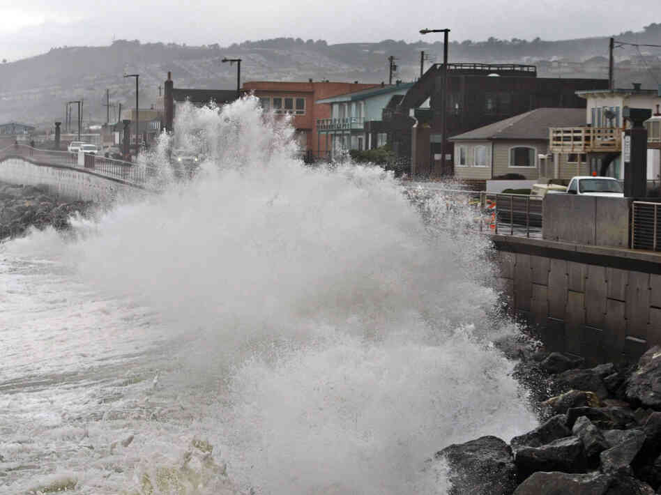 Waves pound a sea wall in Pacifica, Calif., during a storm in 2010. Small assumptions can make a big difference when putting a price-tag on future disasters. Waves pound a sea wall in Pacifica, Calif., during a storm in 2010. Small assumptions can make a big difference when putting a price-tag on future disasters.
