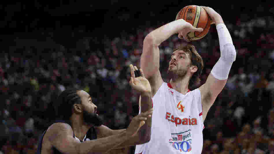 Spanish star Pau Gasol shoots over France's Ronny Turiaf during a pre-Olympic game earlier this month. Gasol, who regularly plays for the Los Angeles Lakers, was Spain's leading scorer in the 2008 Olympics, when the team won a silver medal. The Spaniards may have the best chance of upsetting the favored U.S. team at the London Olympics.