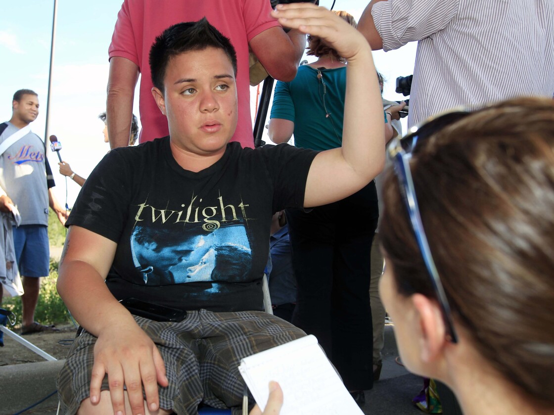 Jennifer Seeger of Aurora, Colo., describes being in the Century 16 theater during the mass shooting on Friday.