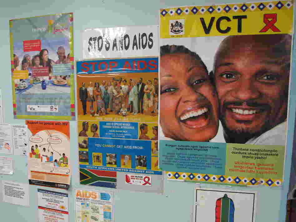 Anti-AIDS posters hang in the Eshowe public health clinic in South Africa's Kwazulu-Natal province. Clinicians there are hoping to slow the spread of HIV by getting more people treatment.