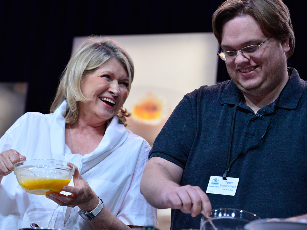 Martha Stewart and Todd VanDerWerff work on omelets during her cooking demonstration.
