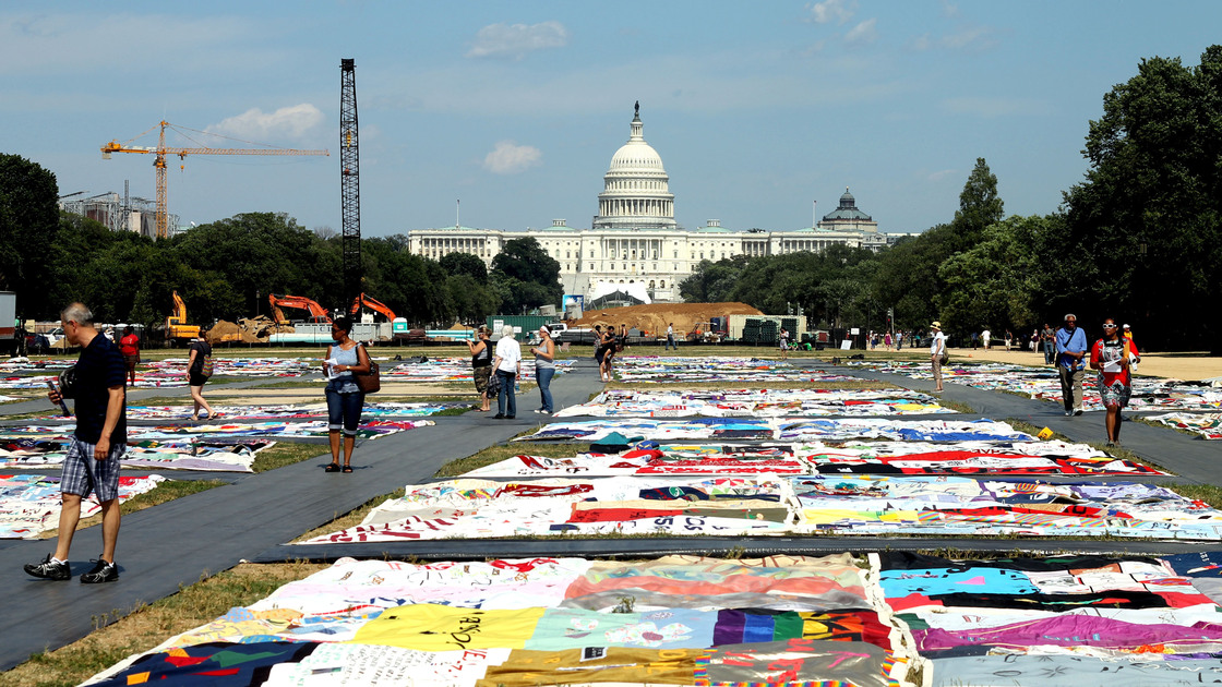 Visitors view the AIDS Memorial Quilt at the National Mall in Washington, D.C., where the International AIDS Conference is being held this week.