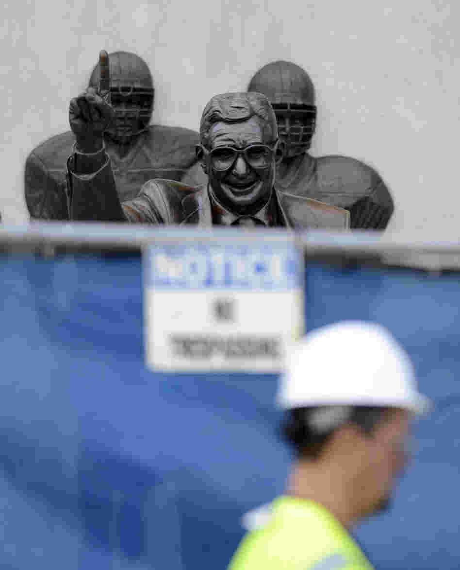 The famed statue of Joe Paterno was taken down from outside the Penn State football stadium Sunday after top officials were accused in a scathing report of burying child sex-abuse allegations against a now-convicted retired assistant.