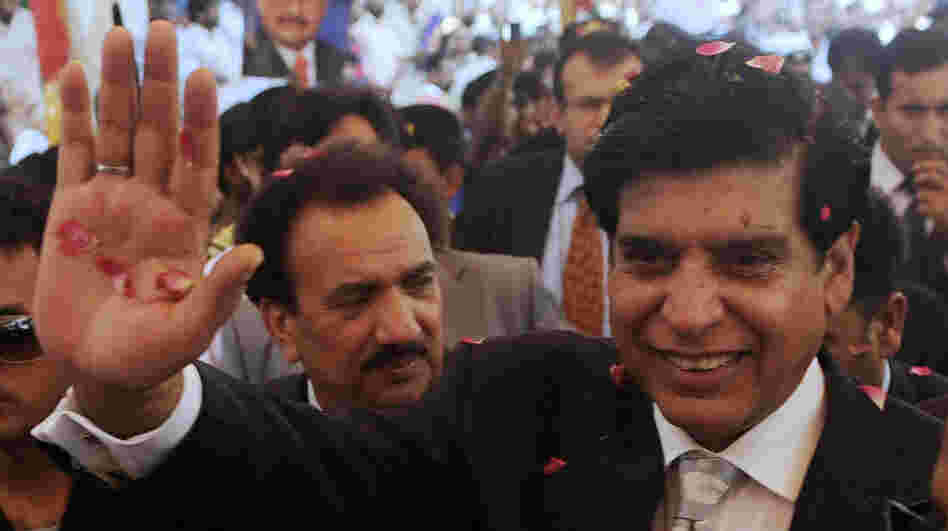 Pakistani Prime Minister Raja Pervez Ashraf is greeted after his election in June. Just weeks later, many Pakistanis expect the nation's Supreme Court may soon attempt to force Ashraf from his position, as it did his predecessor.
