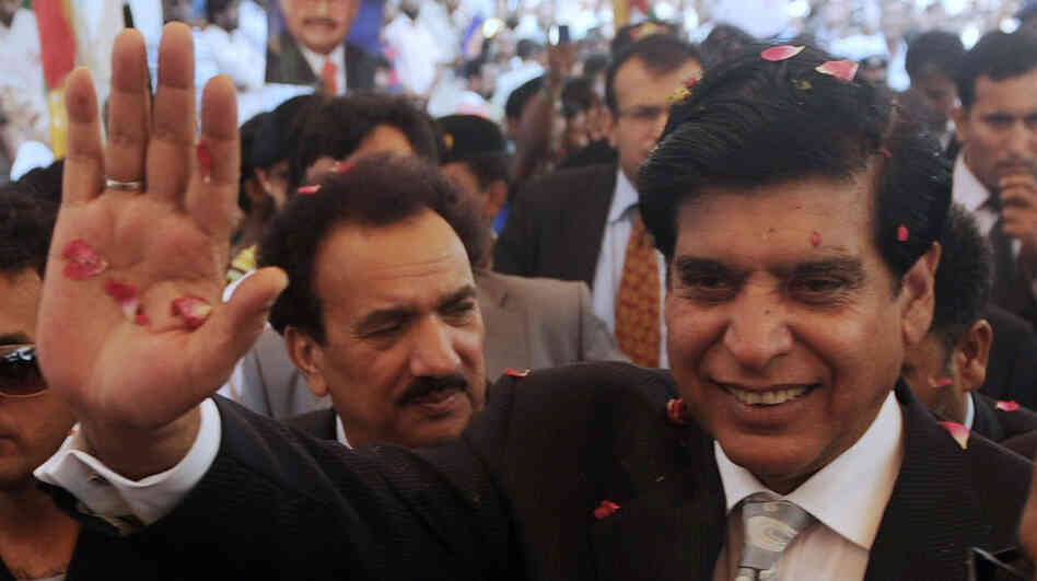 Pakistani Prime Minister Raja Pervez Ashraf is greeted after his election in June. Just weeks later, many Pakistanis expect the nation's Supreme Court may soon attempt to force Ashraf from his position, as it did his predecessor.