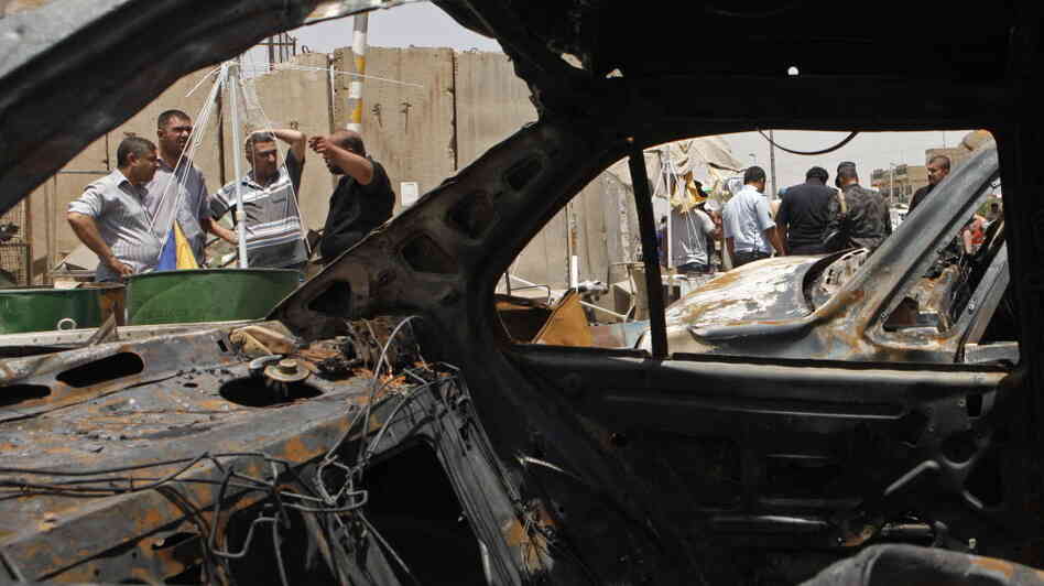In Baghdad's Sadr City district, the view through a vehicle that was destroyed in one of today's attacks.