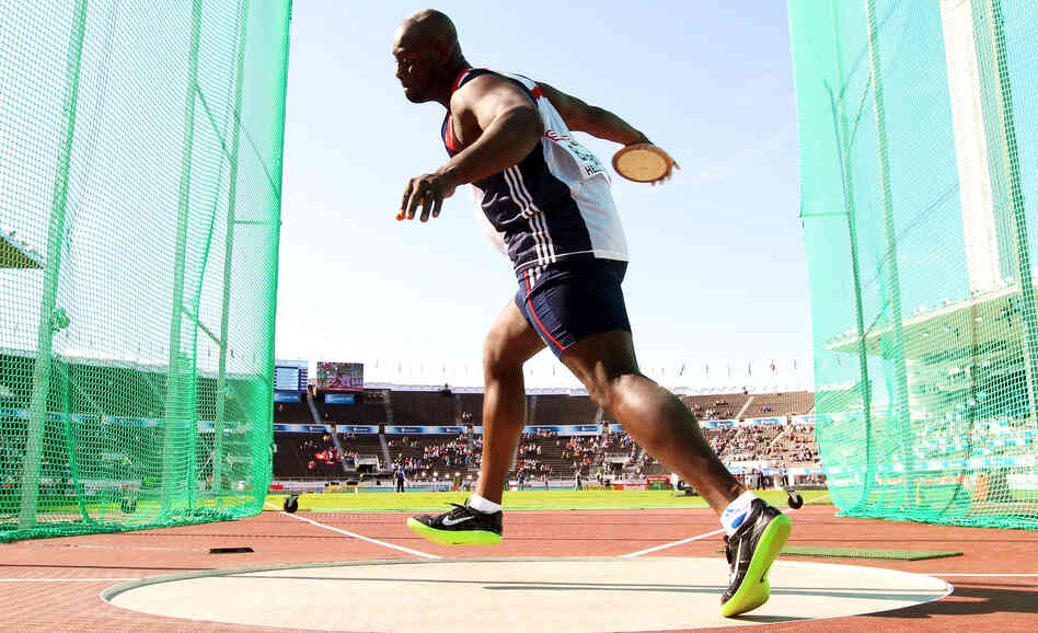 Britain's Abdul Buhari competes in the discus at the European Athletics Championships last month. With the Olympics coinciding with Ramadan, Buhari and many other Muslim athletes are postponing their fasting until after their events.