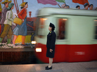 An attendant stands near the tracks as a metro train arrives in a subway station in Pyongyang, North Korea on August 20, 2007. An attendant stands near the tracks as a metro train arrives in a subway station in Pyongyang, North Korea on August 20, 2007.