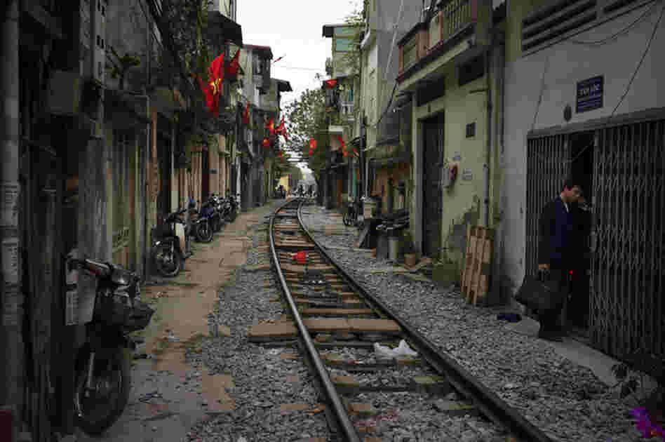 A neighborhood built along railroad tracks is seen in Hanoi, Vietnam, February 2010.